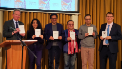 Author Nirmal Kumar Thapa presenting his Nepalese short story collection Ekanta during a cultural programme at UPF-UK in London.