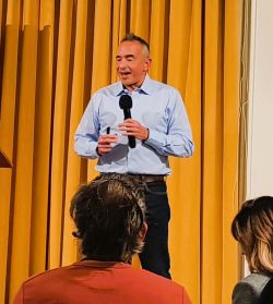 Jeremy Blain and participants launch of MAGE – Men Advocating Gender Equality at the UPF-HQ. They are gathered to listen and discuss the plan for MAGE.